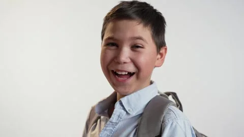 Happy boy with bag on white background Stock-Footage 241023938