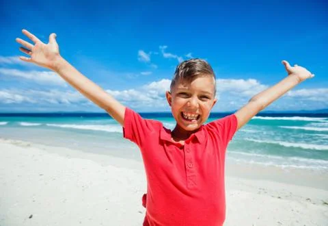 Happy boy on the beach 写真素材