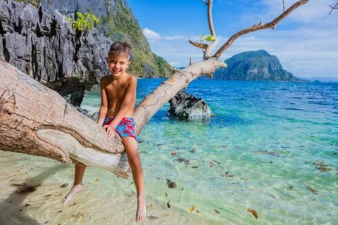 Happy boy on beach. 写真素材
