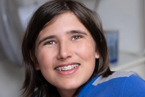 Happy boy with braces, smiling Stock Photos