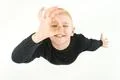 The happy boy gesture to the camera. View from above Photo