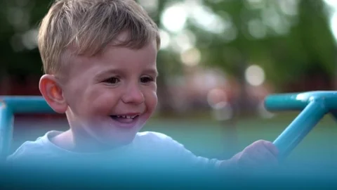 Happy Boy having fun on the playgound Stock Footage 79976321