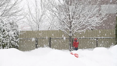Happy Boy jumping on a Winter Day - Footage Stock Footage 149459915