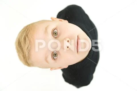 The happy boy look to the camera. View from above Stock Photos