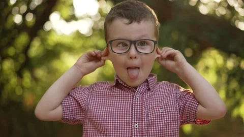 Happy boy making funny faces Stock Footage 163734364