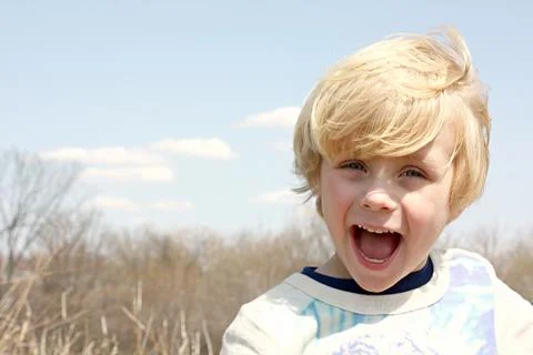 Happy boy outside Stock Photos