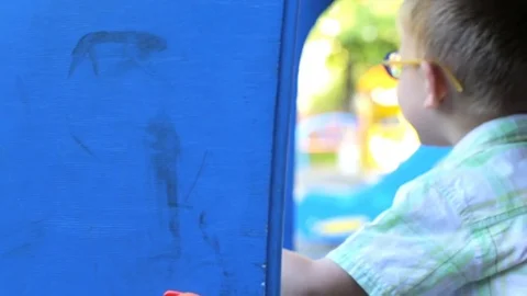 Happy boy at the playground Stock Footage 79789073