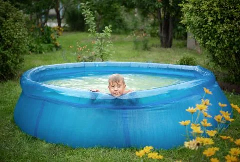 Happy boy playing on hot summer day. Foto stock