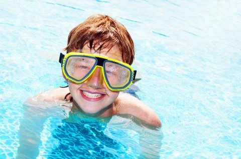 Happy boy in a pool Foto stock