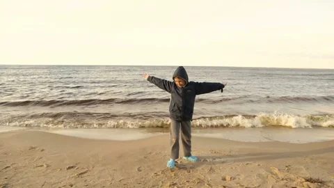 Happy boy on the sandy beach Stock Footage 76941033