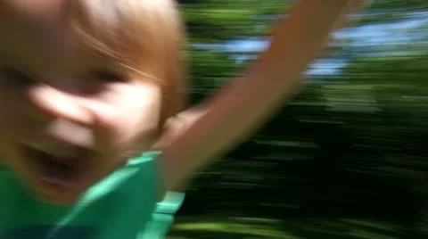Happy boy spinning Stock Footage 12059743