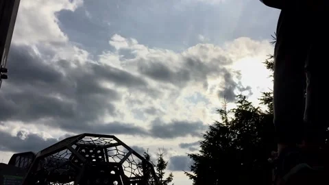 Happy Boy on swing on Playground in sunset. Slow motion, view from back, low ang Stock Footage 162027720