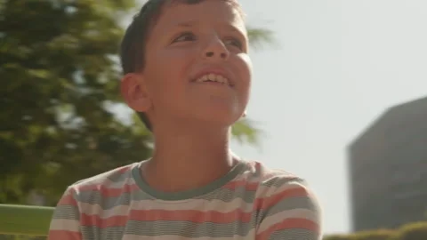 Happy Boy on a Swing Set With His Grandpa Stock Footage 304275138