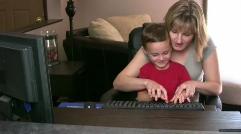 Happy Boy Typing Stock Footage 521980