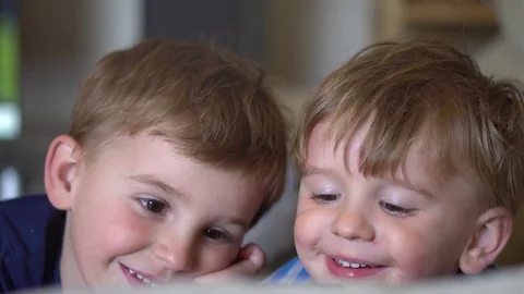 Happy Boys watching iPad  Stock Footage 79966458