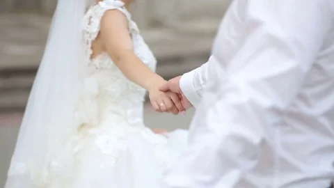 Happy bride and groom dancing on a street Stock Footage 85319641
