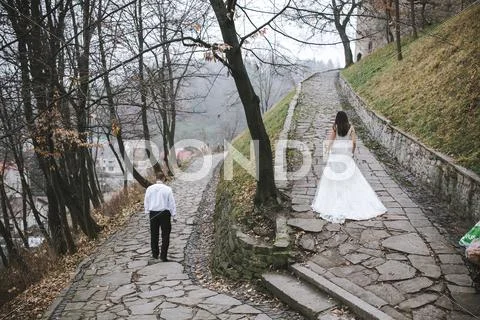 Happy bride and groom posing Stock Photos