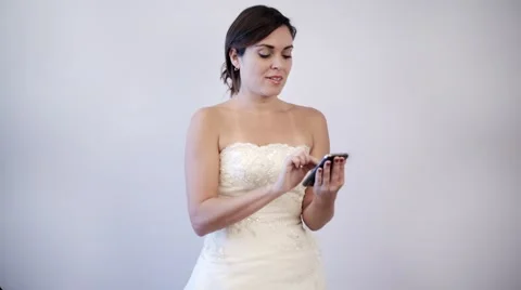 Happy bride to be making a call on her cellphone Stock Footage 43096010
