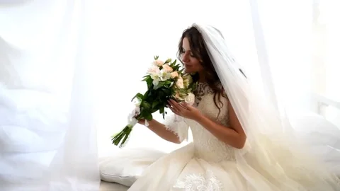 Happy bride with flowers Stock Footage 74768503