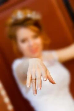 Happy bride shows ring on his finger. 写真素材