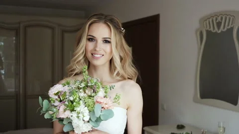 Happy bride smiling at the camera Video stock 85497491