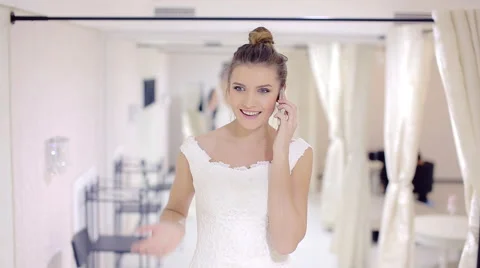 Happy bride talking on the phone Stock Footage 59337406