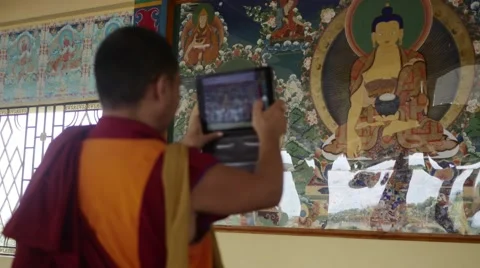 Happy Buddhist Monk taking ipad photo Stock Footage 60047613