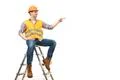 The happy builder on the ladder gesturing on the white background Photo