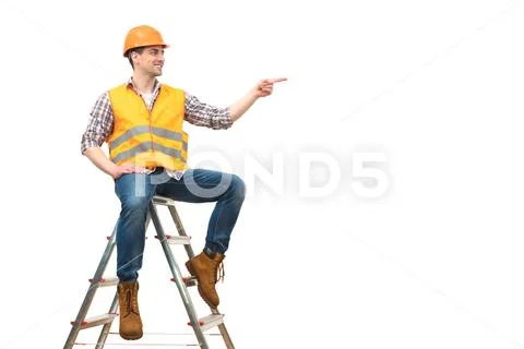 The happy builder on the ladder gesturing on the white background Stock Photos