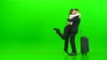 The happy business couple with a bag kissing on the green background 4k or 4k+ Resolution