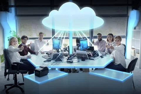 Happy business team with cloud computing hologram Foto stock
