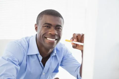 Happy businessman with electronic cigarette Stock Photos