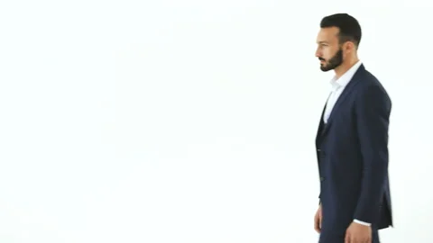 The happy businessman gesturing on the white background Stock Footage 100748272