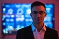 The happy businessman in glasses on the screen background Photo