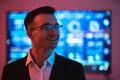The happy businessman in glasses on the screen background Photo