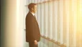 The happy businessman phones in the office hall. slow motion 4k or 4k+ Resolution