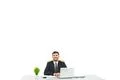 The happy businessman sitting at the desktop on the white background Photo