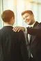 The happy businessmen pat on the shoulder Photo