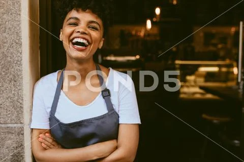 Happy cafe owner Stock Photos