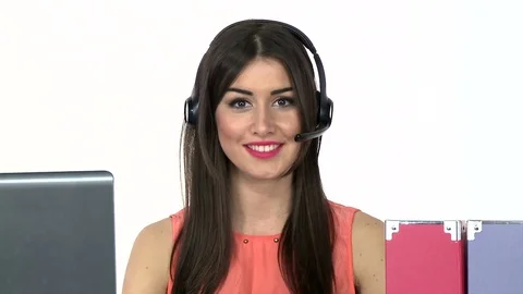 Happy call center operator talking with client and smiling Stock Footage
