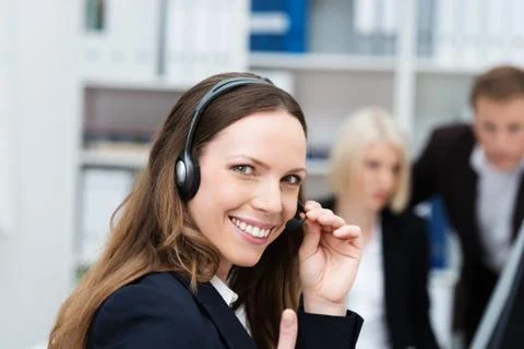 Happy call centre operator Stock Photos