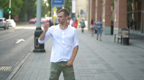 Happy caucasian dancer man funky street dancing freestyle in the city Video stock 66112257