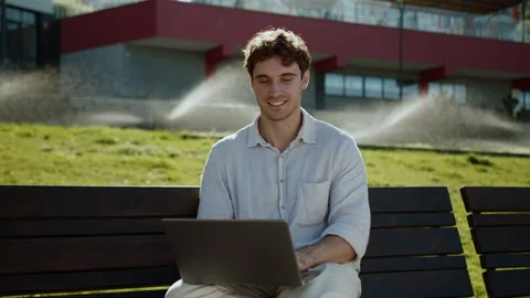 Happy Caucasian man using laptop computer pc programmer smile businessman Stock Footage 294130949