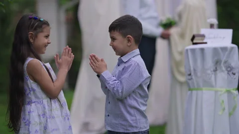 Happy cheerful Middle Eastern children clapping smiling looking at camera with Stock Footage 155079563