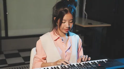 Happy cheerful pretty smiling of young Asian woman vocalist Wearing Headpho.. Stock Footage 293113664