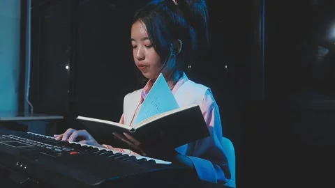 Happy cheerful pretty smiling of young Asian woman vocalist Wearing Headpho.. Stock Footage 293114344