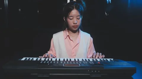 Happy cheerful pretty smiling of young Asian woman vocalist Wearing Headpho.. Stock Footage 293114524