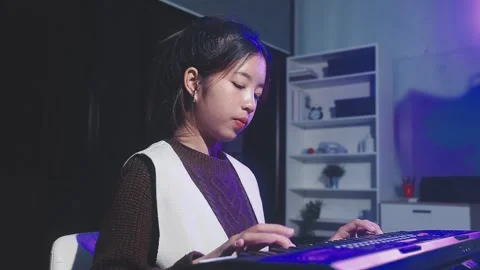 Happy cheerful pretty smiling of young Asian woman vocalist Wearing Headpho.. Stock Footage 293114787