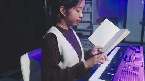 Happy cheerful pretty smiling of young Asian woman vocalist Wearing Headpho.. Stock Footage 293114882