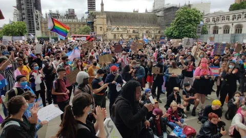 HAPPY CHEERING AND CLAPPING CROWDS TRANS RIGHTS PROTEST LONDON, 4K Stock Footage 134351898